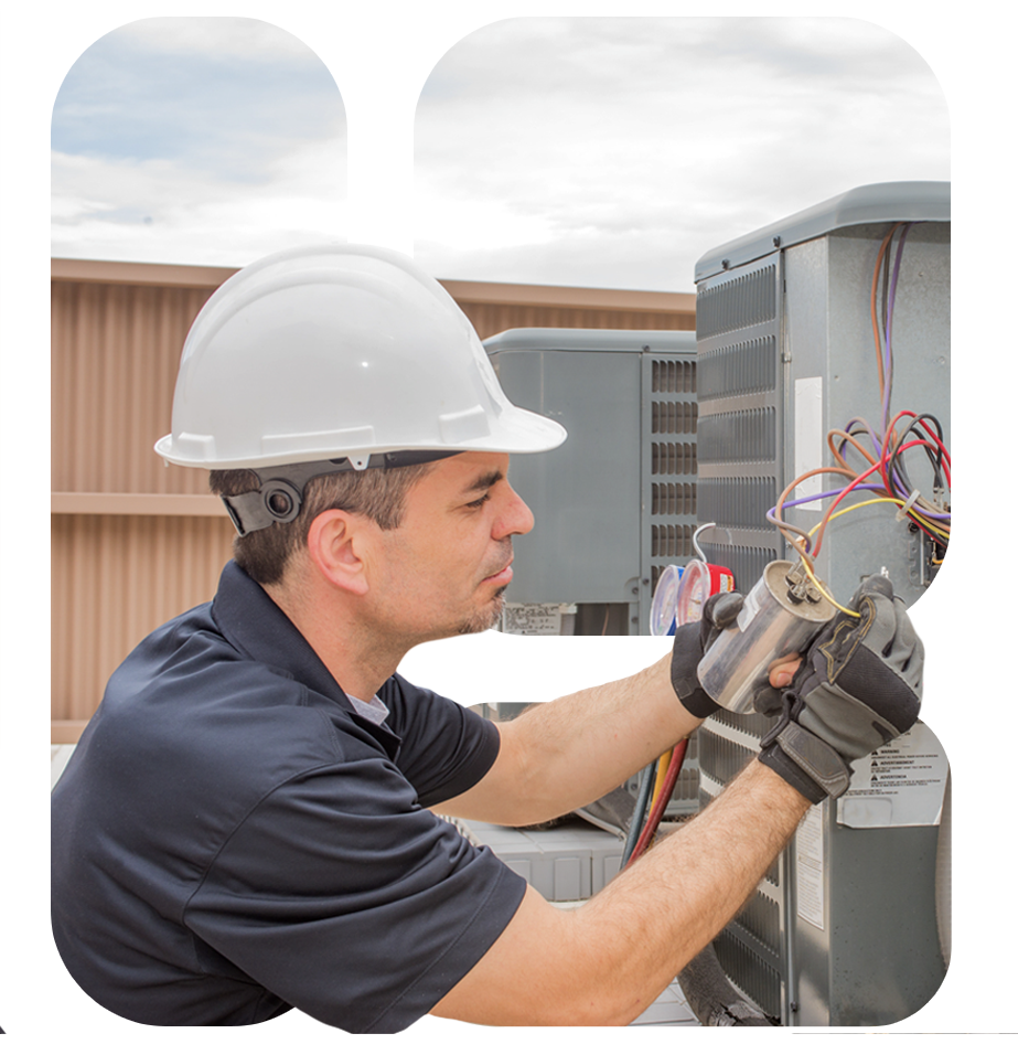 technician fixing on an air condition unit