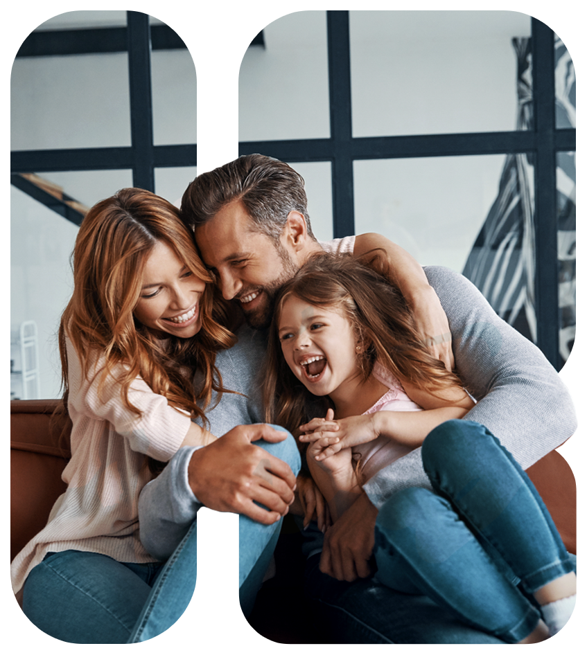 a family hugging and laughing